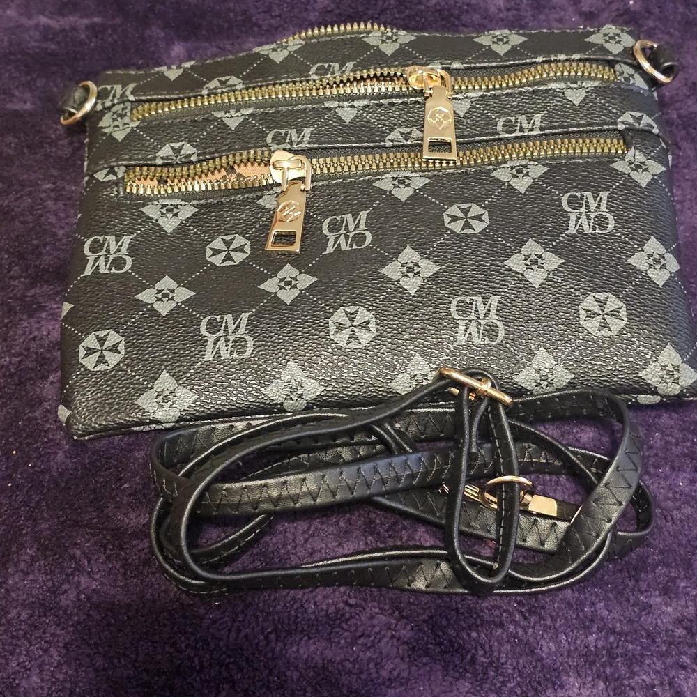 Black Crossbody Bag with Gold Zippers With Two Front Zipper Packets.